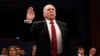 John Brennan, mantan direktur Badan Intelijen Pusat (CIA), diambil sumpahnya sebelum memberikan kesaksian di depan Komisi Senat Amerika, Selasa (23/5).