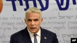 资料照片:以色列“拥有未来”党领袖拉皮德(Yair Lapid)在议会发表讲话(2021年5月31日)