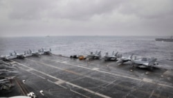 资料照片:美国海军尼米兹号航空母舰在孟加拉湾参加印度、日本和美国的三边演习。(2017年7月17日)