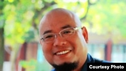 网名“超级低俗屠夫”的中国草根维权人士吴淦(网络图片)