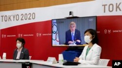 东京奥运组成员在东京召开视频会议。(2021年6月21日)