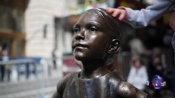 “华尔街铜牛”要“无畏女孩”走开 “华尔街铜牛”要“无畏女孩”走开