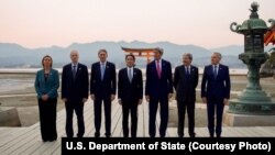 Indonesia firefighters try to extinguish a fire on fishing boats at Benoa harbour in Denpasar, on Indonesia's resort island of Bali.