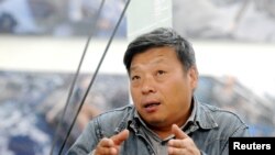 知名中国籍摄影师卢广