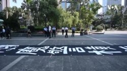 数千港人中环快闪游行 抗议警暴哀悼去世科大生 数千港人中环快闪游行 抗议警暴哀悼去世科大生