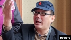 澳大利亚籍作家杨恒均 图片来源:路透社 2014年7月