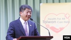 资料照：台湾卫福部长陈时中在记者会上