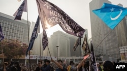 香港抗议者星期天(12月22日)举行“声援维吾尔族人权集会”。