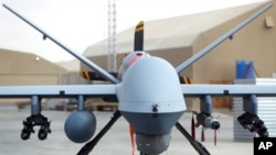 资料照片:美国在阿富汗坎大哈机场展出的MQ-9 型无人机(2018年1月23日)