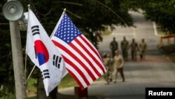 资料照:韩国与美国国旗