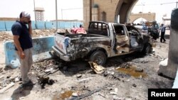 Hiện trường vụ đánh bom tự sát ở Rashidiya, Baghdad, ngày 13/7/2016.