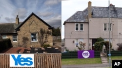 苏格兰埃克尔斯一个支持独立的标语牌(左)以及苏格兰伯恩茅斯一个反对独立的标语牌(右)。(2014年9月8日)
