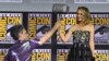 Sutradara Taika Waititi memberikan palu Thor kepada Natalie Portman di acara panel Marvel Studios saat mengumumkan film "Thor Love And Thunder" di ajang Comic-Con International Sabtu, 20 Juli, 2019 di San Diego (Foto: Chris Pizzello/Invision/AP)