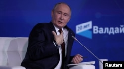 普京首度公开祝贺特朗普赢得美国大选,并表示莫斯科已准备好与其进行对话。(路透社:2024年11月7日)