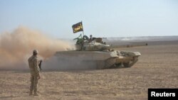 Xe của lục quân Iraq tham gia cuộc tiến công chiếm lại thành phố Mosul từ tay Nhà nước Hồi giáo ở Iraq, ngày 21 tháng 10, 2016.