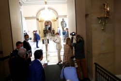 U.S. Speaker of the House Nancy Pelosi wears a face mask as she walks to the House Chamber ahead of a vote on an additional economic stimulus package, during the spread of the coronavirus disease, on Capitol Hill, April 23, 2020.