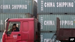 Apple employees celebrate outside the Apple store on New York's 5th Avenue, shortly before the new Apple iPad Air tablets went on sale.