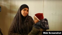 穆萨娜和她的儿子(资料图)。