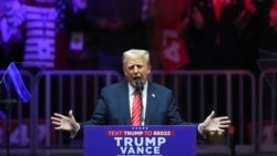 特朗普1月19日在正式宣誓就职前,在一个集会上讲话。