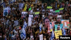 以色列人参加反对总理内塔尼亚胡政府的示威活动,并呼吁在以色列与哈马斯冲突期间释放加沙人质。(路透社:2024年9月8日)