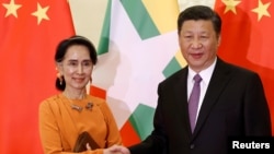中国国家主席习近平和缅甸领导人昂山素季(2017年5月16日资料照)