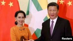 中国国家主席习近平和缅甸领导人昂山素季(2017年5月16日资料照)