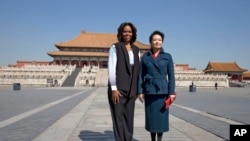 Iranian worshipers recite verses of the Quran, Islam's holy book, during the Muslim holy fasting month of Ramadan at the shrine of Saint Mohammad Helal Ibn Ali in the city of Aran and Bidgol, some 140 miles (225 kilometers) south of the capital Tehran.