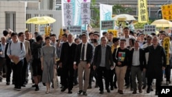 2019年4月9日,占中九子抵达香港西九龙裁判法院,(右起)邵家臻、李永达、黃浩铭、戴耀廷、陈建民、朱耀明、陈淑庄、锺耀华以及张秀贤