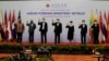 oreign ministers of the Association of Southeast Asian Nations (ASEAN) pose for a photo during a photo session in Phnom Penh, Cambodia.