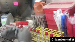 Covid 19 testing in lab (Photo credit Dr Phyu Myat)