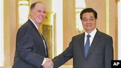 多尼隆去年9月在北京会见胡锦涛