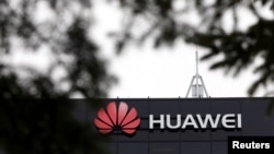 在加拿大渥太华的华为公司研究所外的标记。(2018年12月6日)