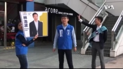 香港选民排长队在区议会选举中投票 香港选民排长队在区议会选举中投票