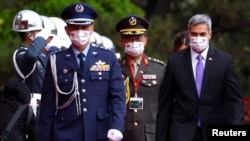 资料照片：2023年2月16日，巴拉圭总统贝尼特斯在台北总统府前参加欢迎仪式。（路透社照片）