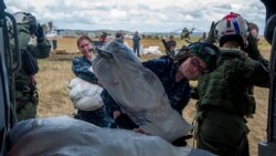 音频报道:美国表示在菲律宾的救援行动将进行到底 音频报道:美国表示在菲律宾的救援行动将进行到底