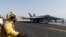 Chiến đấu cơ F / A-18C Hornet cất cánh từ tàu sân bay USS George HW Bush tại Vịnh Ba Tư, ngày 12 tháng 8, 2014.