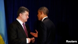 6月4日,奥巴马总统在华沙会见乌克兰当选总统波罗申科。