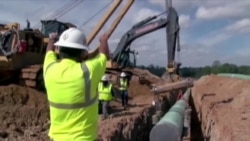 美加输油管道政治争吵升温 美加输油管道政治争吵升温