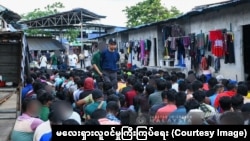 မလေးရှားလူဝင်မှုကြီးကြပ်ရေးဌာနက ထုတ်ပြန်ထားတဲ့ တရားမဝင်နေထိုင်သူတွေကို ဖမ်းဆီးနေသည့် ဓါတ်ပုံ