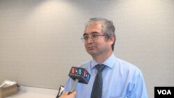 美国维吾尔协会副主席伊利夏提(Ilshat Hassan)