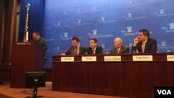 何志平在美国传统基金会举办的座谈会上讲话。(2015年12月9日)