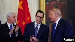 美国官员2020年1月15日出席美中第一阶段贸易协定签署仪式(路透社)