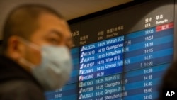 北京首都国际机场2020年1月23日飞往武汉的航班被取消(美联社)