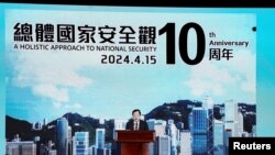 中国的中央港澳办主任夏宝龙2024年4月15日在香港“全民国家安全教育日”开幕活动中通过视频发表谈话。(路透社)