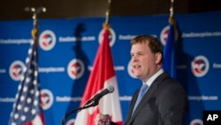 Bộ trưởng Ngoại giao Canada John Baird nói rằng Canada có 'trách nhiệm đạo đức' phải đồng hành với NATO và các đồng minh để hỗ trợ Ukraine