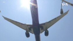 VOA英语视频: 航空公司要求乘客佩戴口罩 VOA英语视频: 航空公司要求乘客佩戴口罩