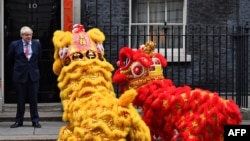 资料照片: 2020年1月24日英国首相约翰逊在唐宁街10号举办中国新年招待会