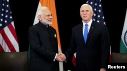 美国副总统彭斯在新加坡东盟峰会期间与印度总理莫迪举行双边会谈。(2018年11月14日)