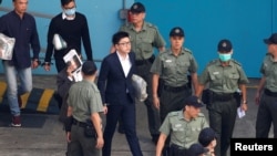 梁天琦2018年6月11日被押往法院接受判决