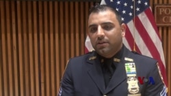 携“炸弹”避开人群,穆斯林警官成为纽约英雄 携“炸弹”避开人群,穆斯林警官成为纽约英雄